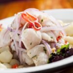 A delicious plate of scallop and peruvian corn Ceviche