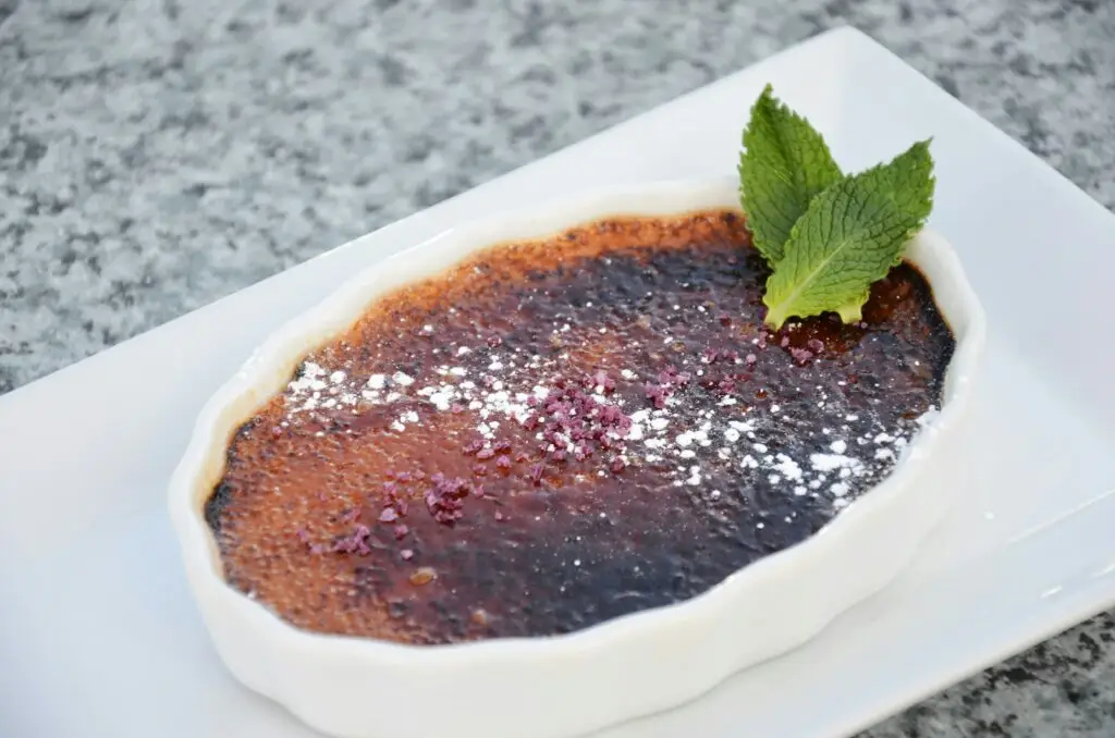 A dish filled with delicious creme brulee