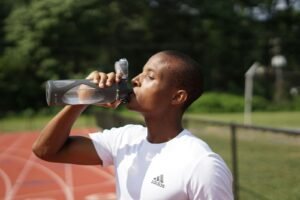 75 Hard Water Rule: A person tracking their daily water intake for the 75 Hard challenge.