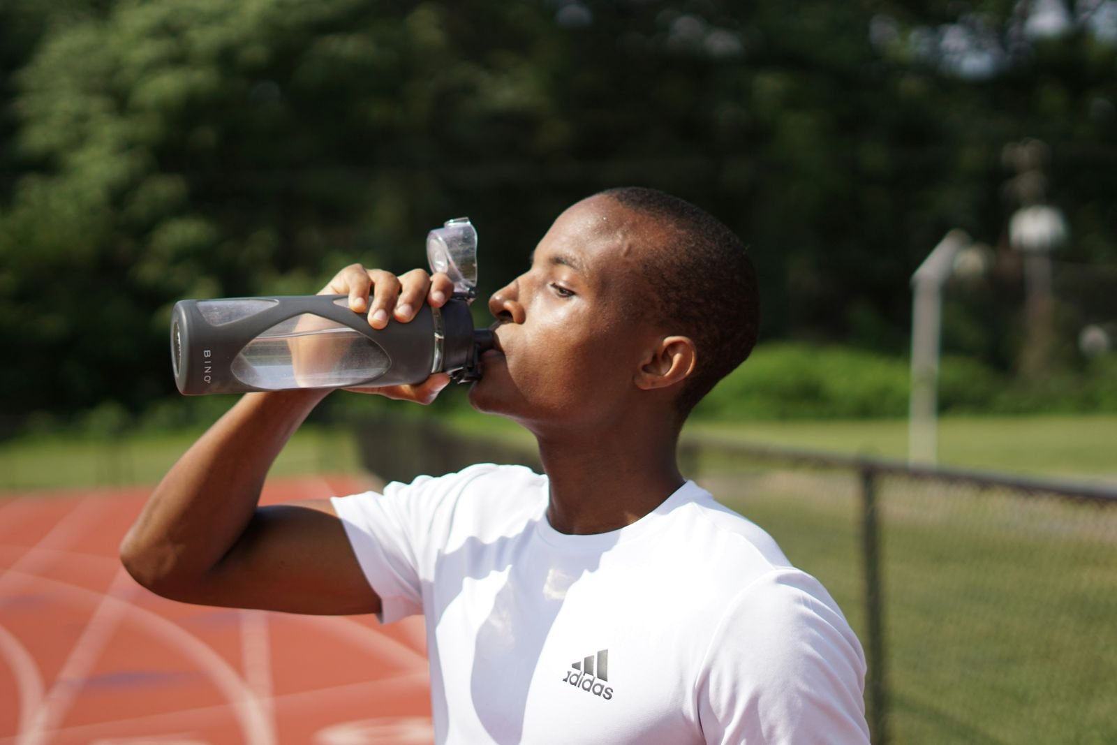 75 Hard Water Rule: A person tracking their daily water intake for the 75 Hard challenge.